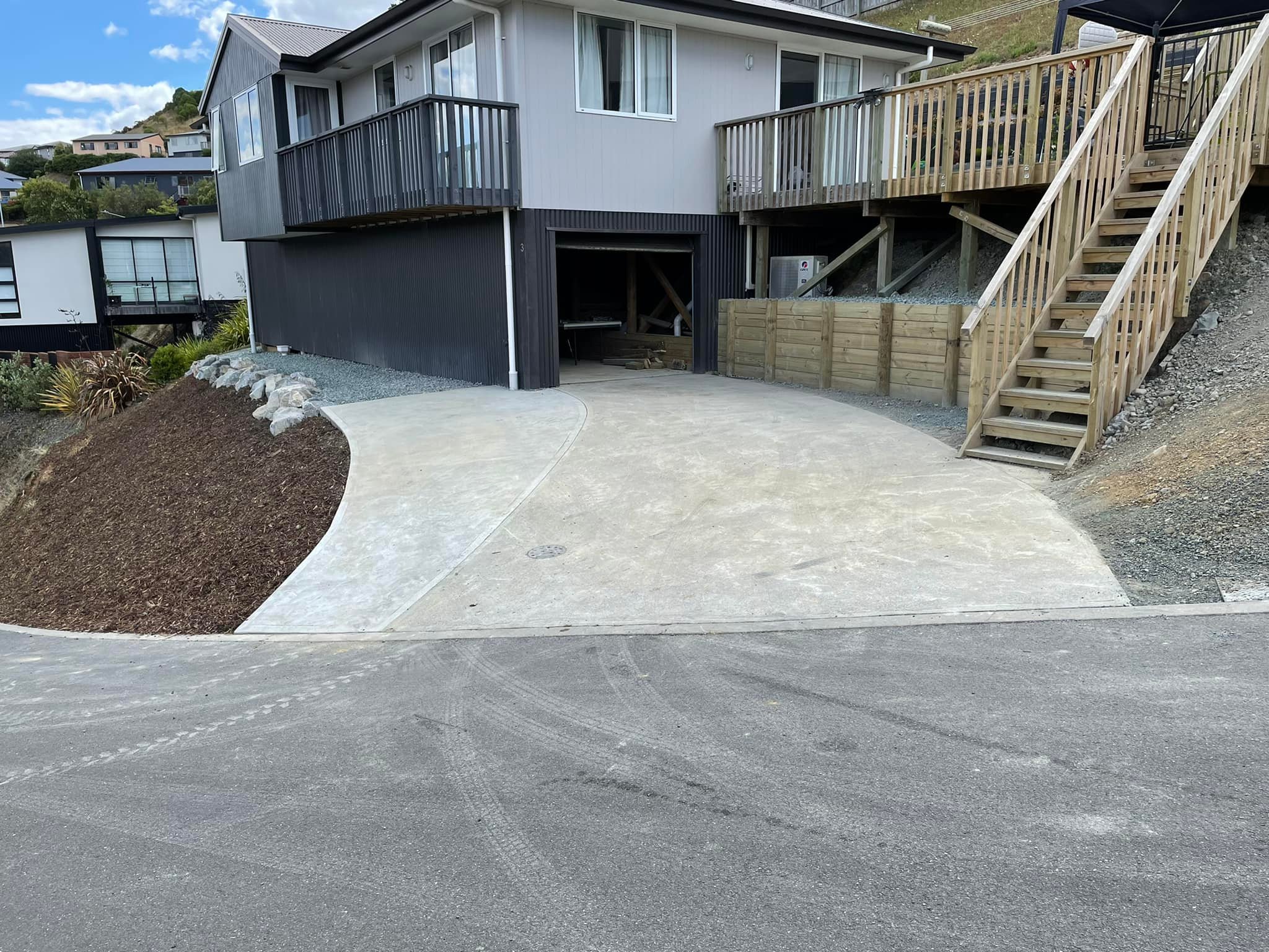 finished retaining wall with driveway