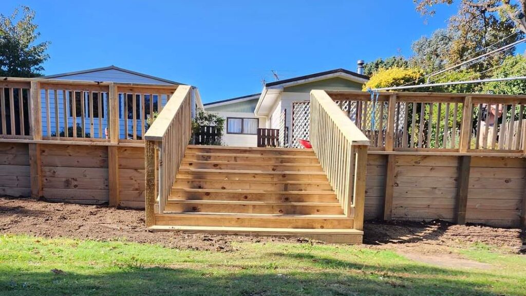 retaining wall with deck stairs in wellington