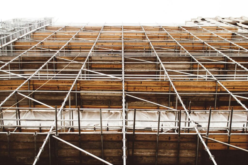 A detailed view of scaffolding at a construction site shows structure and pattern.