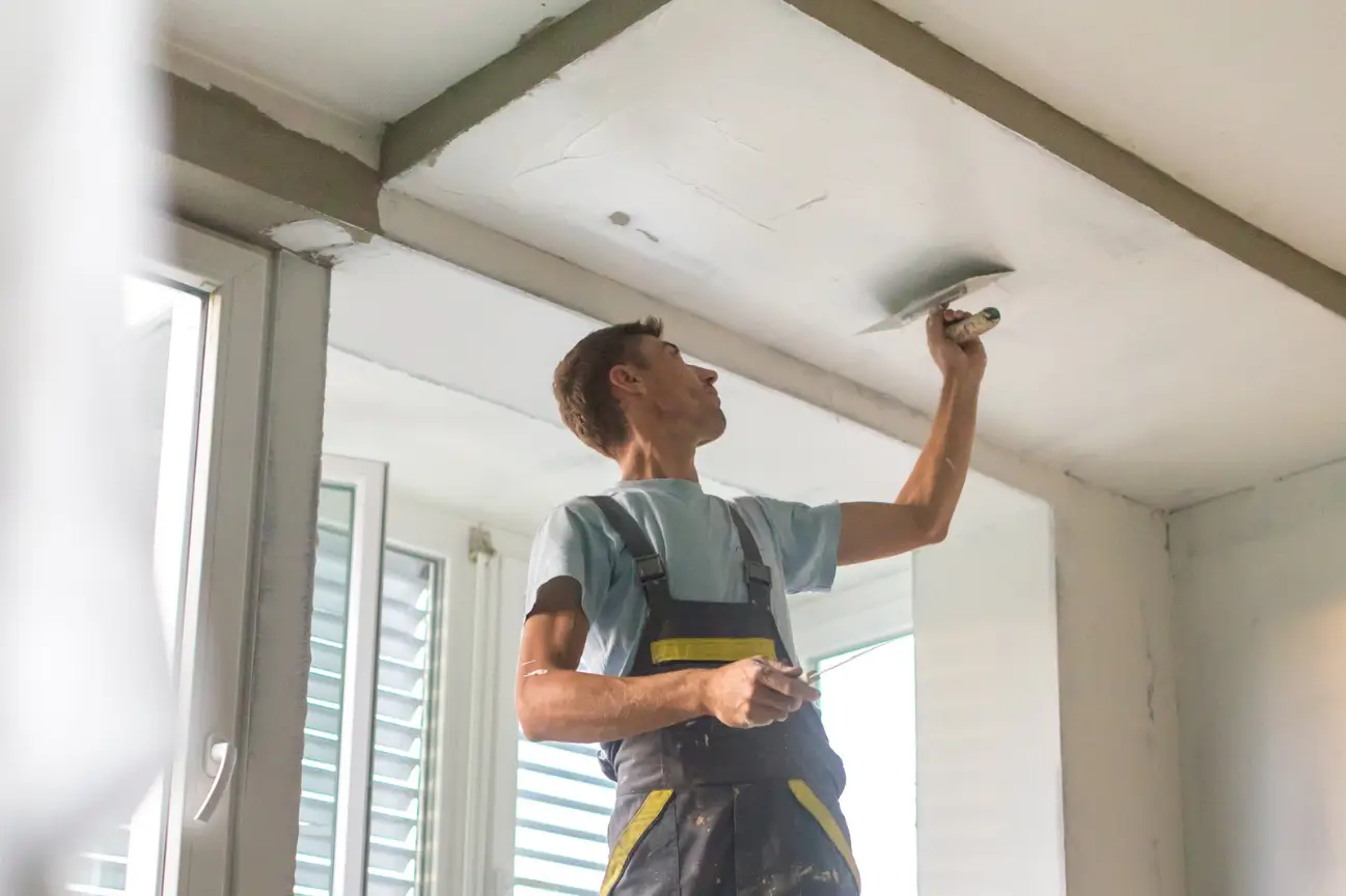 Ceiling plastering work in progress inside a New Zealand home.
