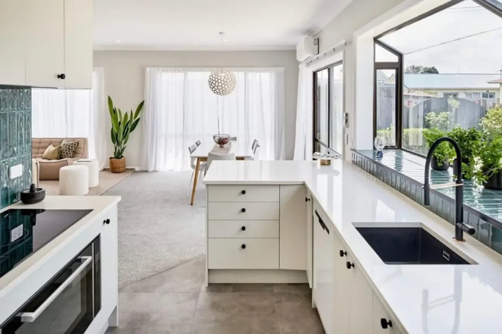 Modern kitchen interior in a New Zealand home showcasing residential plastering finishes.