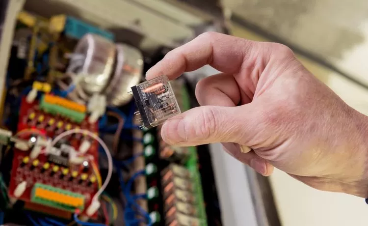 Technician inspecting electrical components during ongoing Switchboard Upgrades in New Zealand.