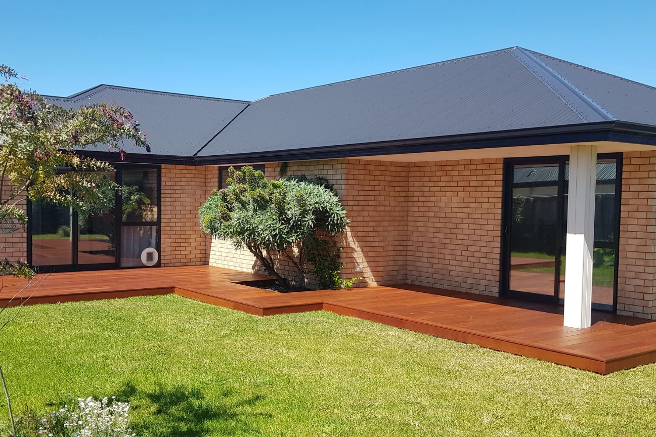 Modern courtyard timber deck installed by deck builders New Zealand.