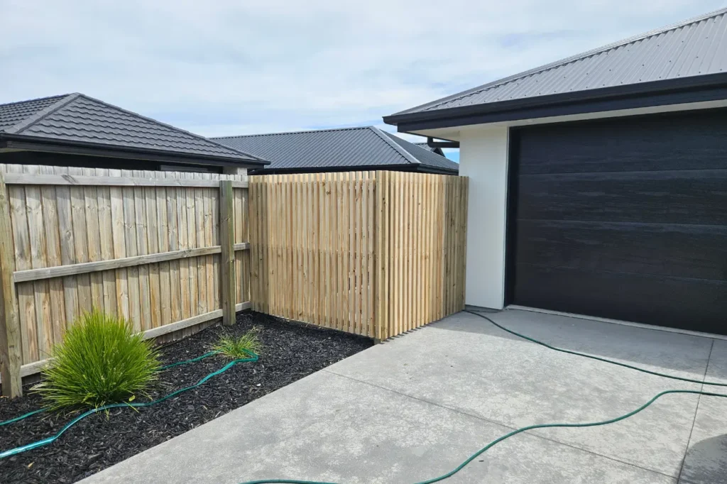 Timber fence and outdoor structure constructed by deck builders New Zealand.
